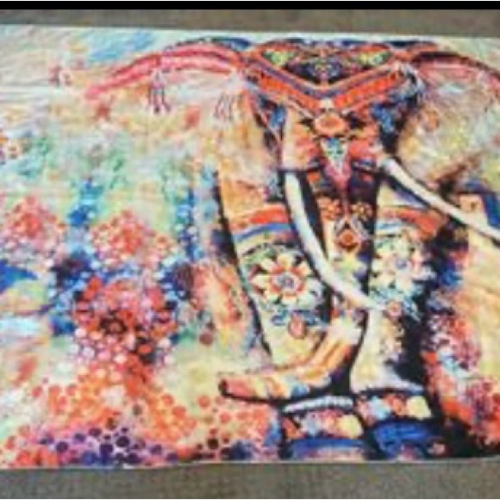 Silk like material with large elephant motif